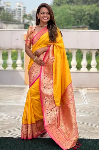 Yellow elegant art silk woven saree with rich zari border