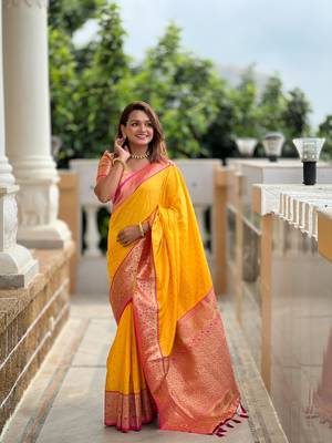 Yellow elegant art silk woven saree with rich zari border 2