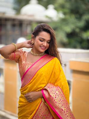 Yellow elegant art silk woven saree with rich zari border 5