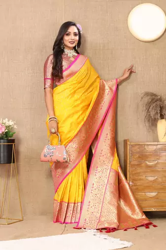 Yellow elegant art silk woven saree with rich zari border