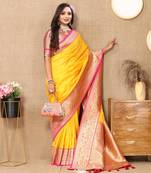 Yellow elegant art silk woven saree with rich zari border