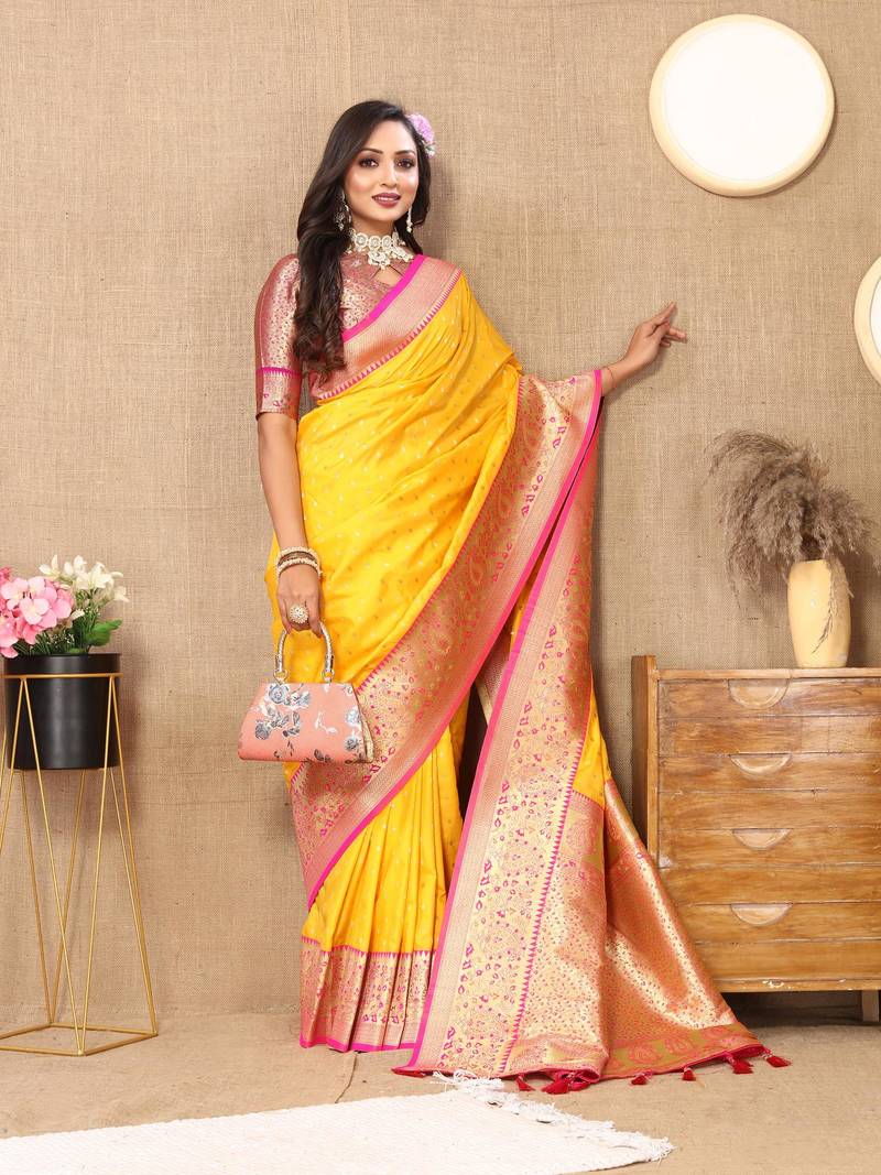 Yellow elegant art silk woven saree with rich zari border