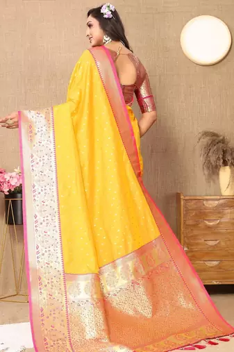 Yellow elegant art silk woven saree with rich zari border