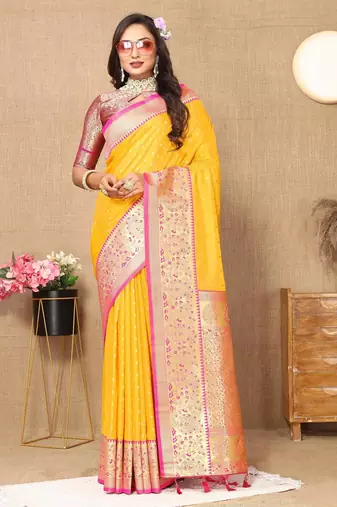Yellow elegant art silk woven saree with rich zari border