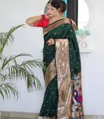 Green elegant art silk woven saree with rich zari border