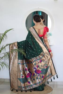 Green elegant art silk woven saree with rich zari border 2