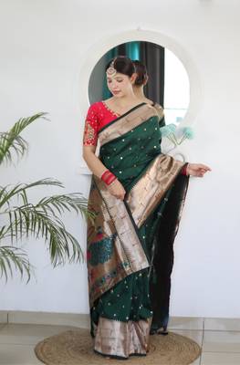 Green elegant art silk woven saree with rich zari border 3