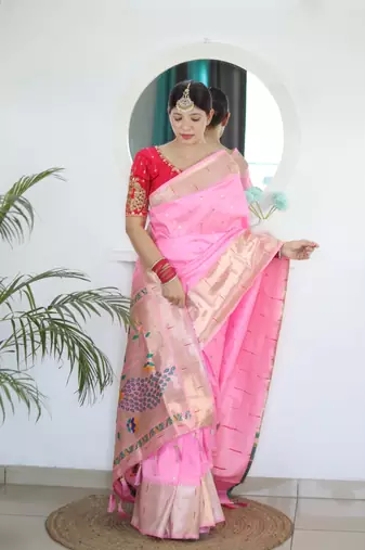 Pink elegant art silk woven saree with rich zari border