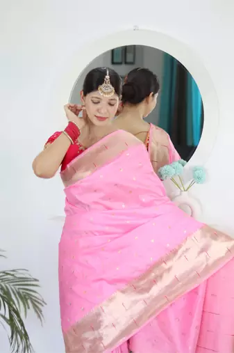 Pink elegant art silk woven saree with rich zari border
