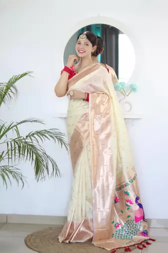 Cream elegant art silk woven saree with rich zari border