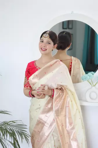 Cream elegant art silk woven saree with rich zari border