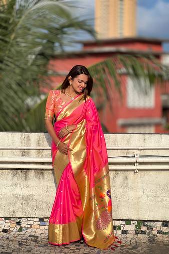 Pink elegant art silk woven saree with rich zari border