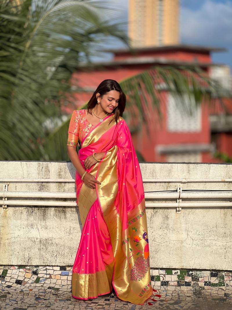 Pink elegant art silk woven saree with rich zari border