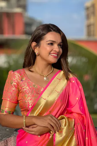 Pink elegant art silk woven saree with rich zari border