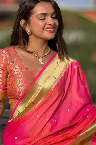 Pink elegant art silk woven saree with rich zari border
