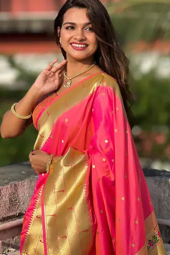Pink elegant art silk woven saree with rich zari border