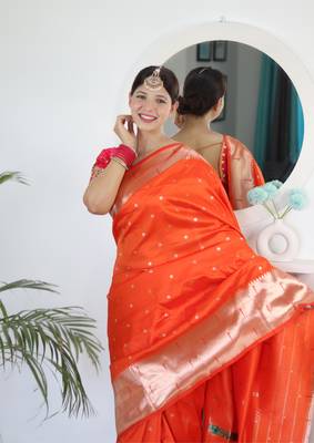 Orange elegant art silk woven saree with rich zari border 4