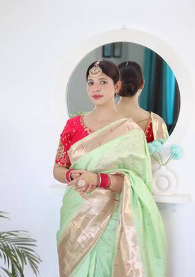 Green elegant art silk woven saree with rich zari border 4