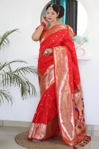 Red elegant art silk woven saree with rich zari border