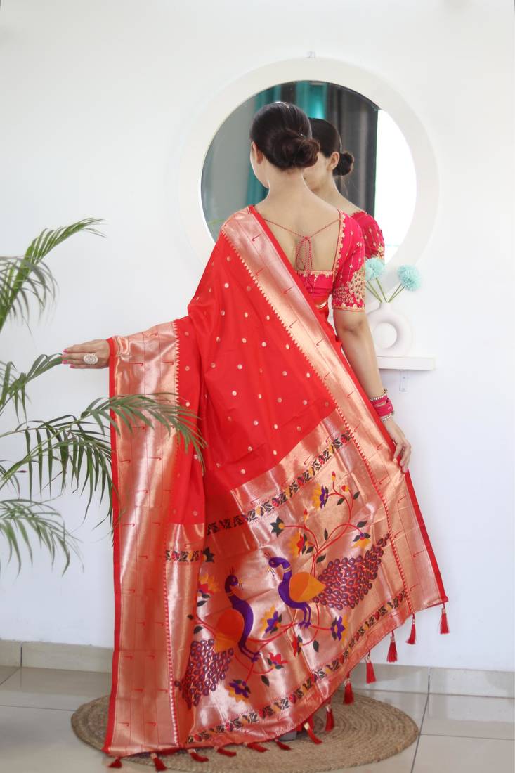 Red elegant art silk woven saree with rich zari border