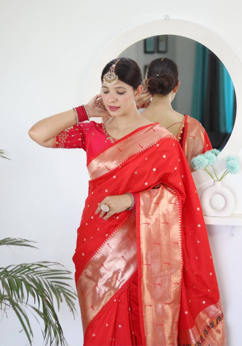 Red elegant art silk woven saree with rich zari border