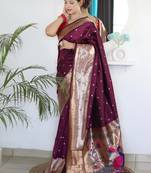 Wine elegant art silk woven saree with rich zari border