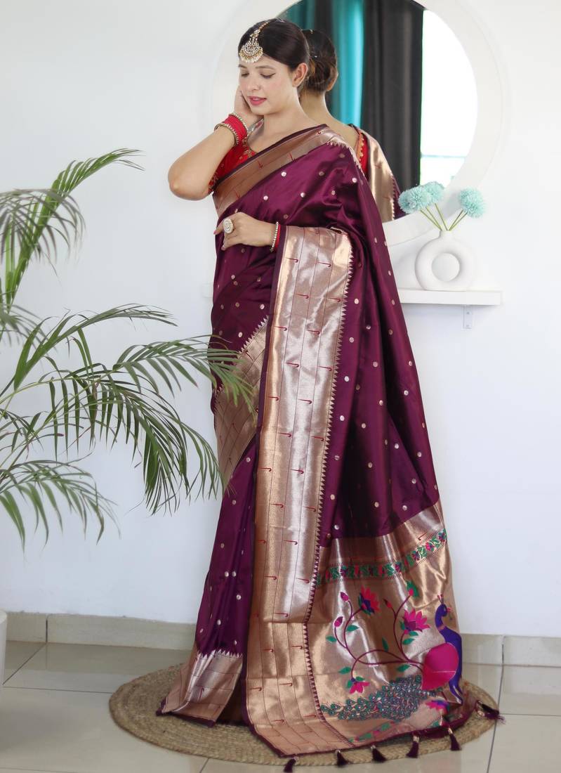 Wine elegant art silk woven saree with rich zari border