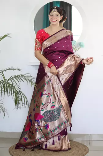 Wine elegant art silk woven saree with rich zari border