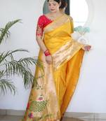 Yellow elegant art silk woven saree with rich zari border
