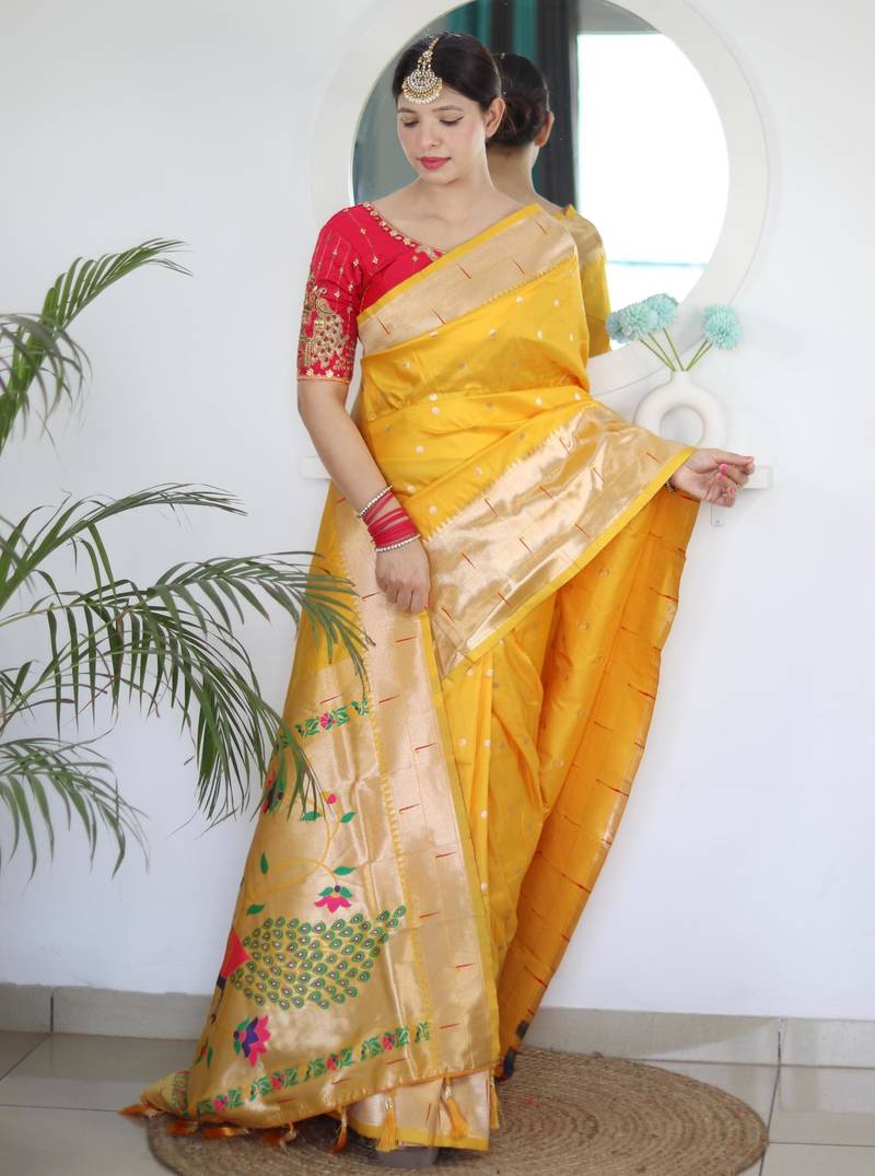 Yellow elegant art silk woven saree with rich zari border