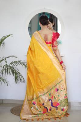 Yellow elegant art silk woven saree with rich zari border 2