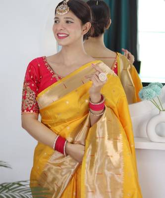 Yellow elegant art silk woven saree with rich zari border 4