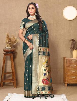 Green elegant art silk woven saree with rich zari border 1