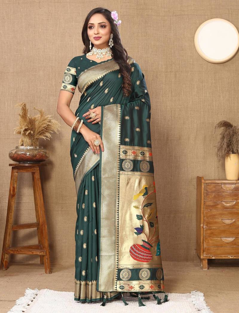 Green elegant art silk woven saree with rich zari border