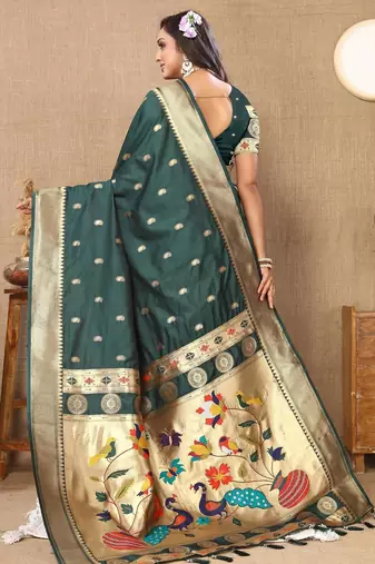 Green elegant art silk woven saree with rich zari border