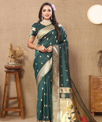 Green elegant art silk woven saree with rich zari border 3