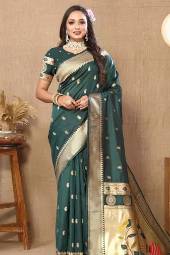 Green elegant art silk woven saree with rich zari border