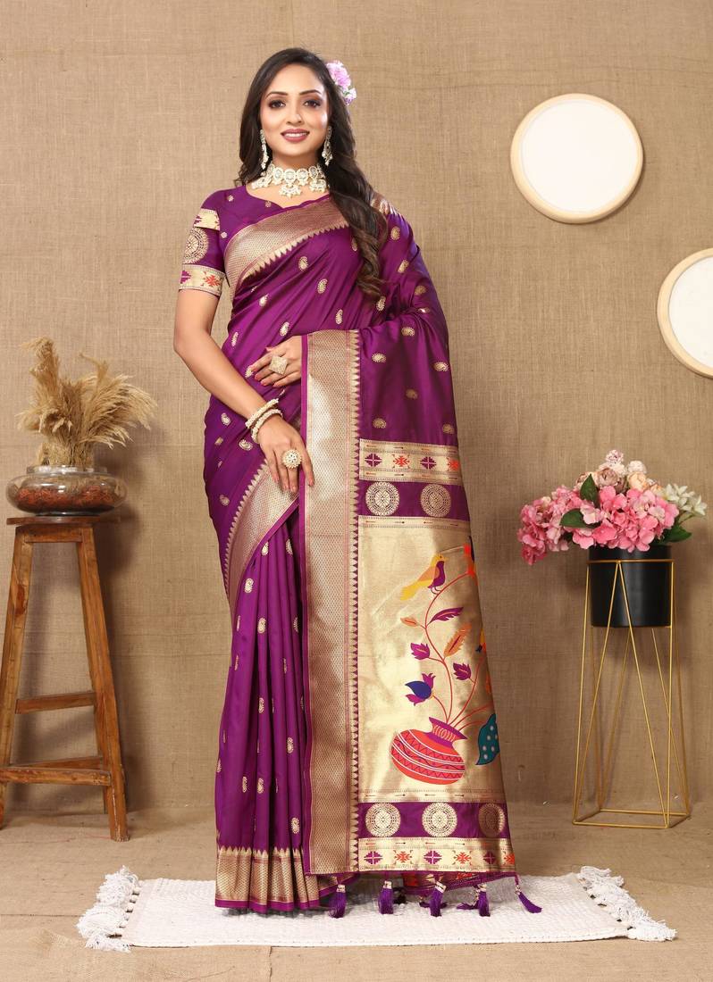 Wine elegant art silk woven saree with rich zari border