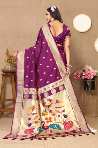 Wine elegant art silk woven saree with rich zari border