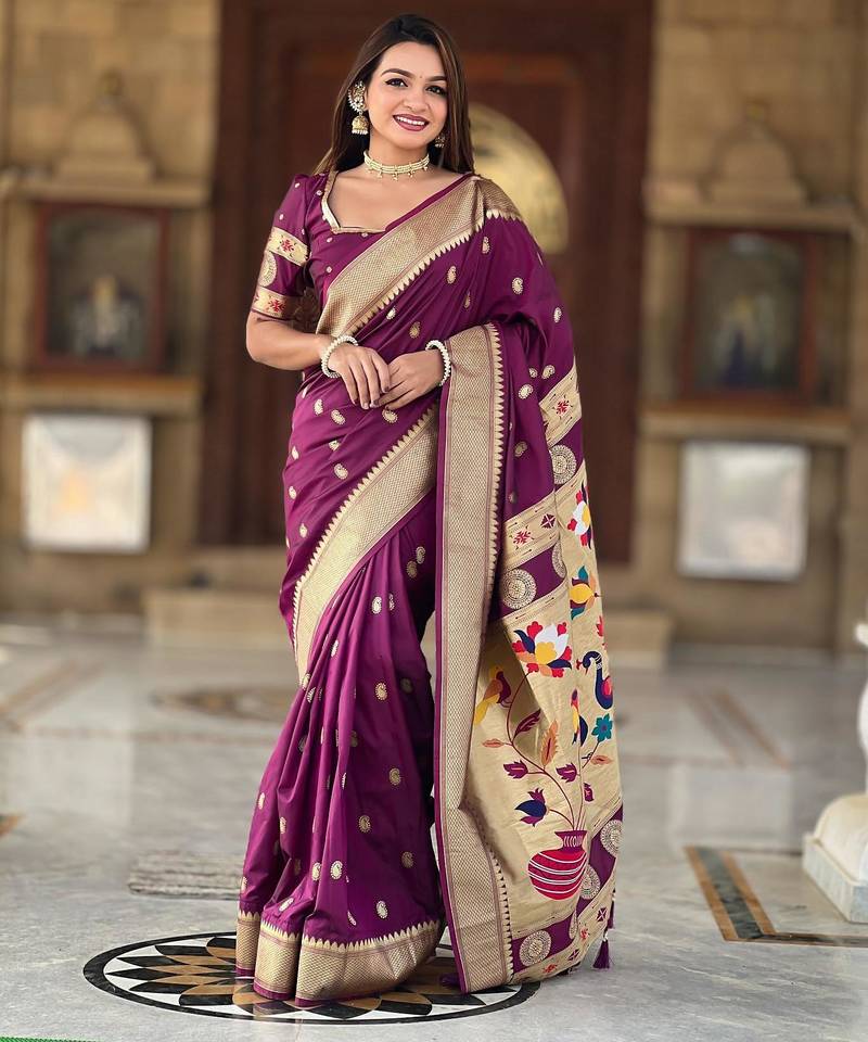 Wine elegant art silk woven saree with rich zari border