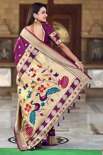 Wine elegant art silk woven saree with rich zari border