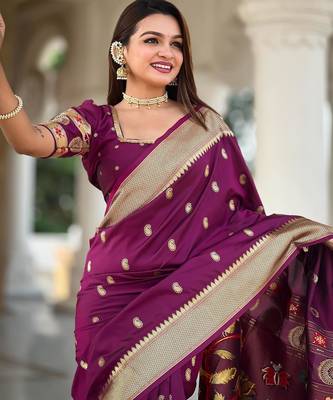 Wine elegant art silk woven saree with rich zari border 3