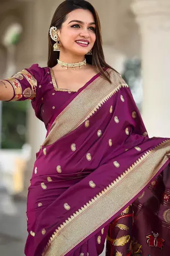 Wine elegant art silk woven saree with rich zari border