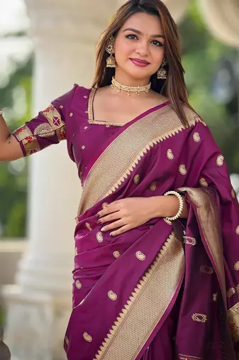 Wine elegant art silk woven saree with rich zari border