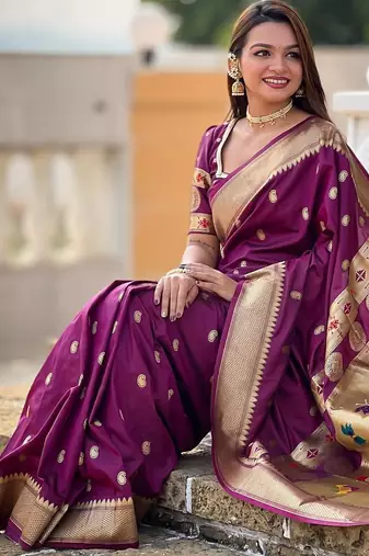 Wine elegant art silk woven saree with rich zari border