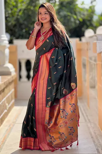 Green elegant art silk woven saree with rich zari border