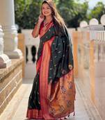 Green elegant art silk woven saree with rich zari border