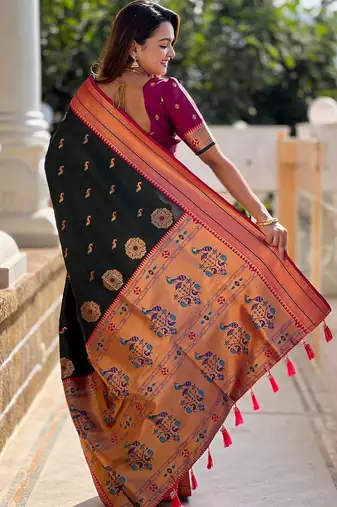 Green elegant art silk woven saree with rich zari border