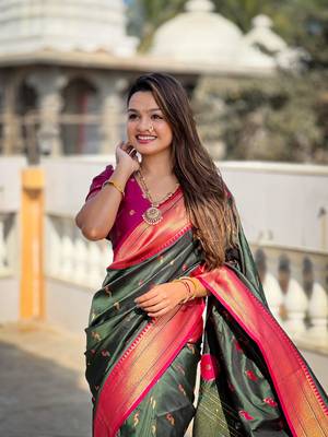 Green elegant art silk woven saree with rich zari border 3