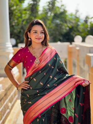 Green elegant art silk woven saree with rich zari border 4